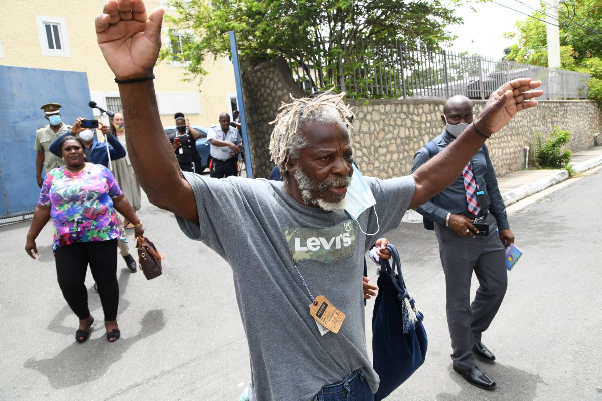 In this June 24, 2020 photo, George Williams, a mentally challenged elderly man, walks free from the St Catherine Parish Court in Spanish Town after being detained in prison for 50 years without trial.