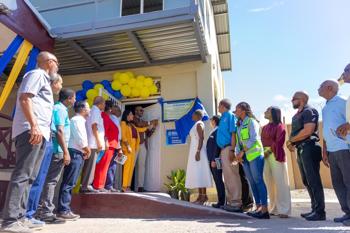 Sponsors of the Matthew 25:40 Project gather for the official unveiling of the donors’ plaque during the handover of the transitional hostel at Matthew 25:40 Boys’ Home on Tuesday.