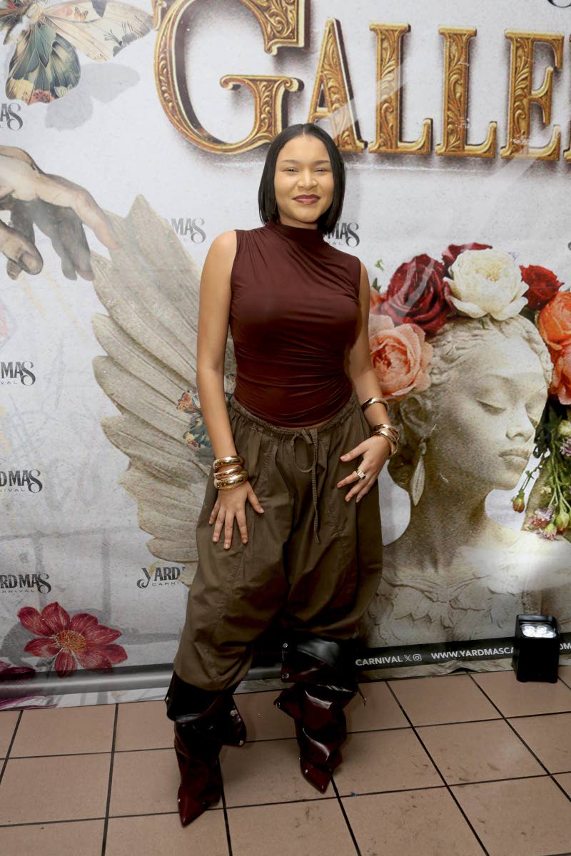 Anna-Lisa Guthrie, Yard Mas creative director, is all smiles as the 2026 costumes were unveiled on Sunday.