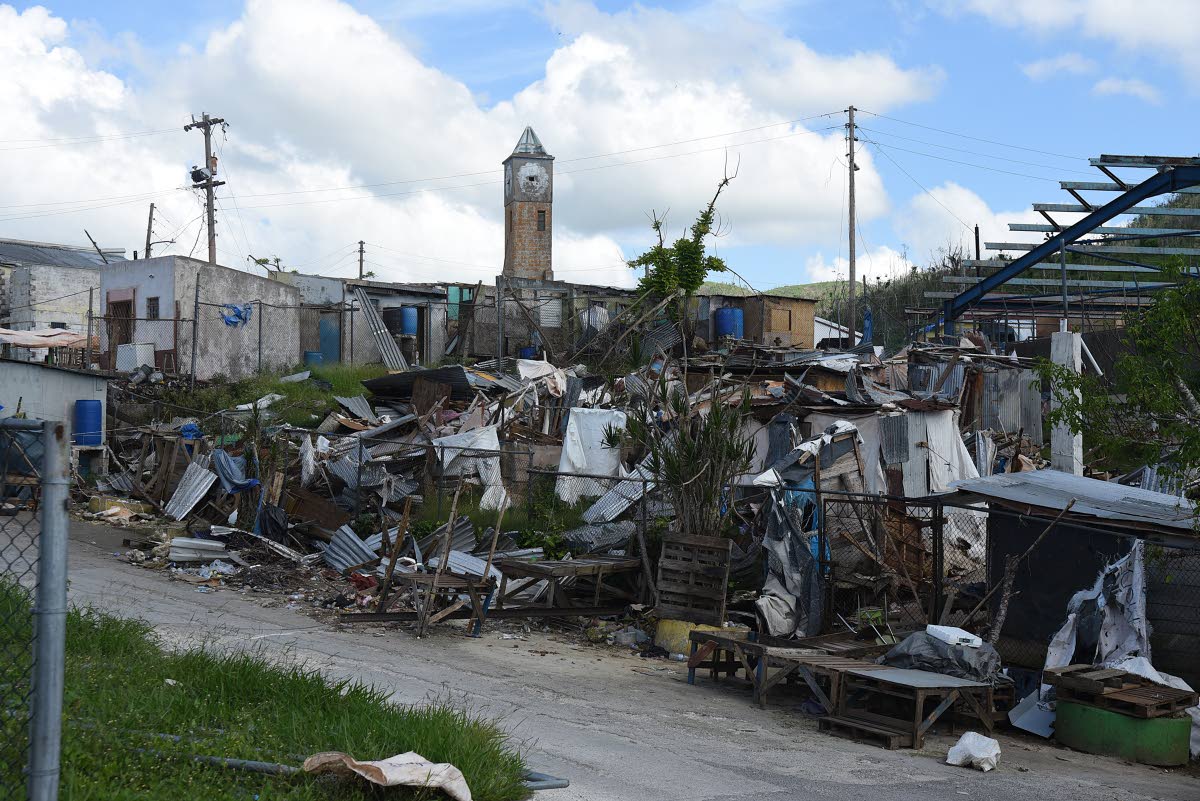 Debris littered the town of Lewisville, in St. Elizabeth, more than a month after the passage of Hurricane Melissa in October 2025.
