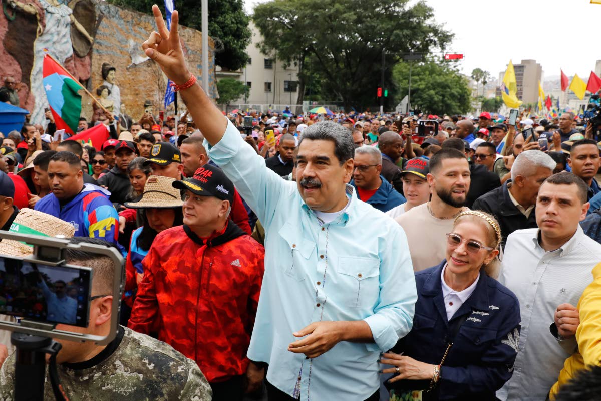 President Nicolas Maduro joins a rally marking the anniversary of the Battle of Santa Ines, which took place during Venezuela’s 19th-century Federal War, in Caracas, Venezuela, Wednesday, December 10, 2025. 