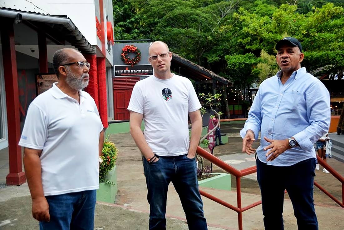 From left: Island Village Operations Manager, Andrew Reid, co-founder of Pure Chocolate, Wouter Tjeertes and Best Dressed Chicken senior executive Andrew Allen at  the Ocho Rios facility recently.
