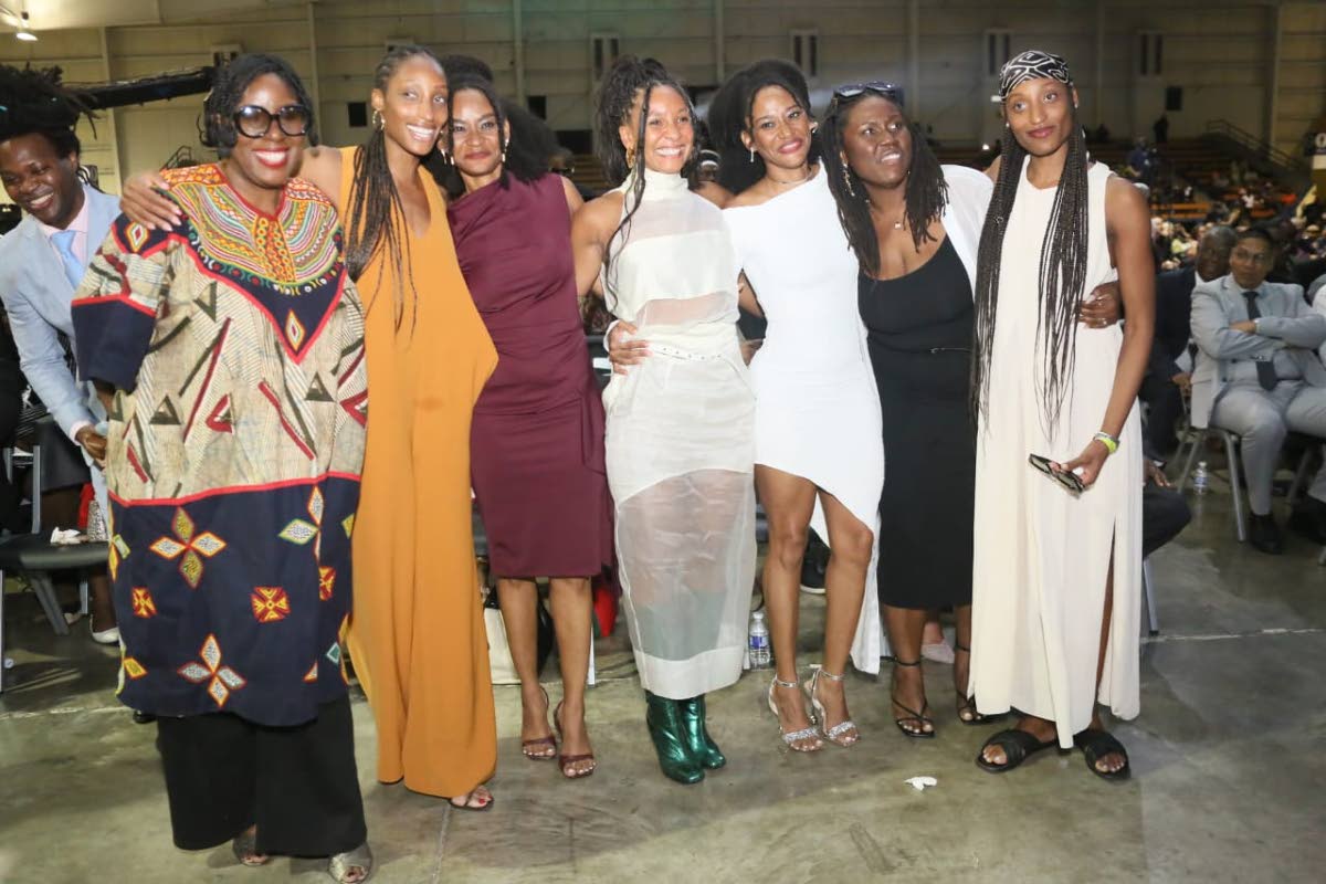 Huddled for a group photo are daughters of the late reggae icon (from left) Odessa Chambers, Azama Bashir, Safa Bashir, Nabiyah Bashir, Sana Bashir, Kadijah Bashir, Azza Bashir.