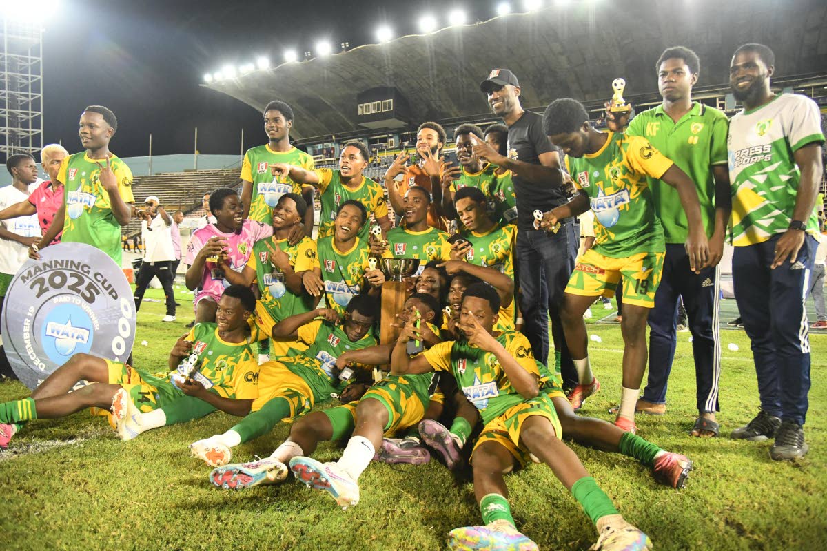 Members of the Excelsior High Manning Cup team celebrate after their win over Jamaica College in the 2025 Manning Cup final at the National Stadium last night.