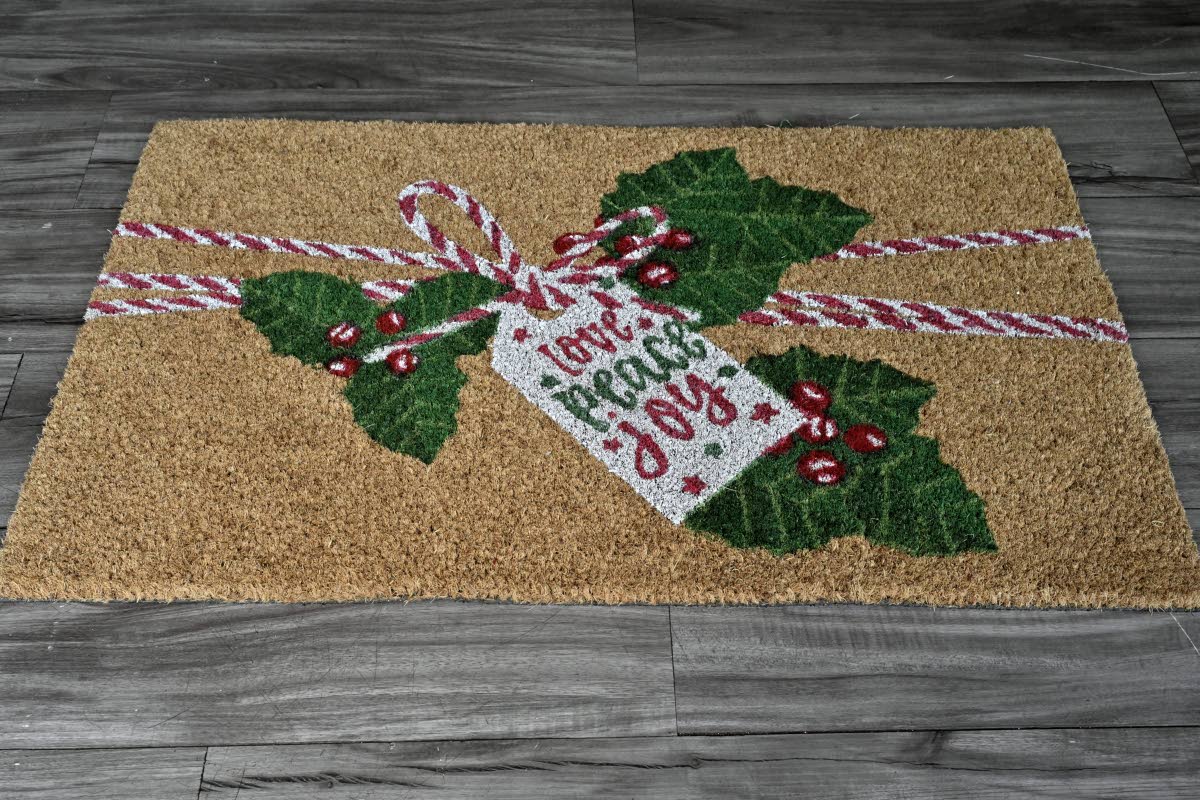 Step up your décor with seasonal entrance mats.