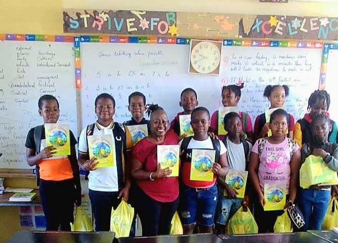 Students of Chester Castle Basic and Primary School pose for a photo.