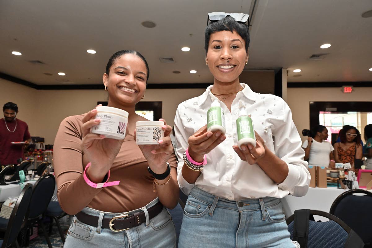 Tiffany Marage (left) and Toni-Ann Hibbert of Skin Fairy Ja pose proudly with their line of beauty care products. 
