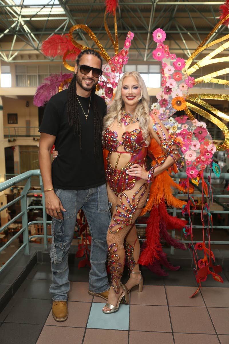 Reggae artiste Skygrass poses with his fiancée, Nicole Arbour, at the Yard Mas Carnival 2026 Galleria hybrid costume presentation, held at Palace Cineplex, Sovereign Centre in St Andrew. The pair are currently filming a reality-style docuseries with US-ba