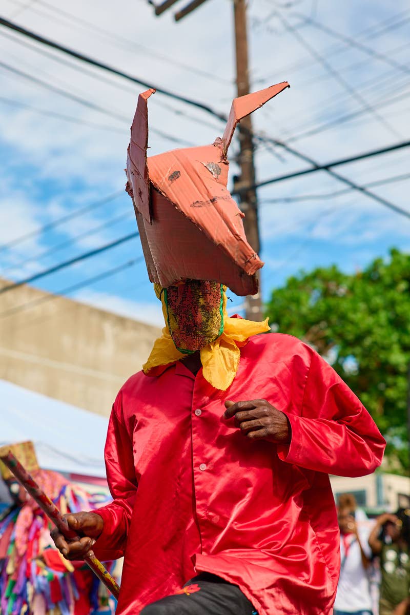 Horse Head rollicks around during the performance. 