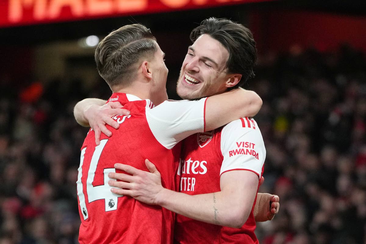 
Arsenal’s Viktor Gyoekeres (left) and teammate Declan Rice celebrate after Brighton’s Georginio Rutter scored an own goal during the English Premier League football match against Brighton and Hove Albion in London yesterday.