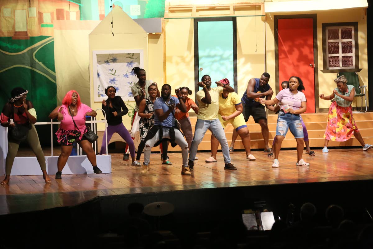 Skillet, (in yellow T-shirt), played by Calneth Reid, suggests that a Round Robin could provide the money to save the Big Yard. The 84th season of pantomime, Big Yaad Vibes, opened on Boxing Day at the Little Theatre, in Kingston.
