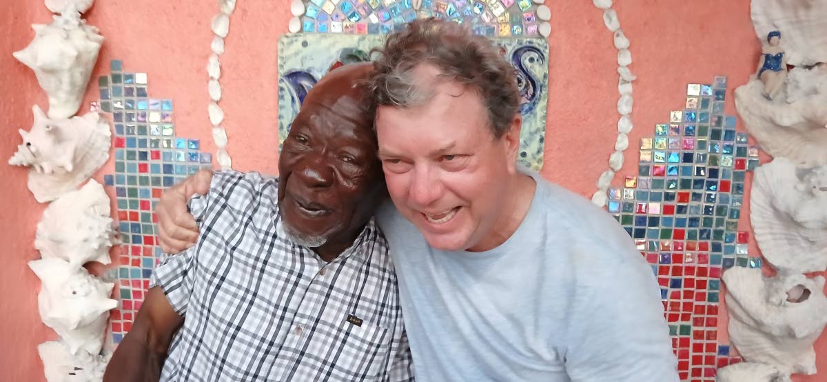 Douglas Turner having a laugh with Jason Henzell, one of the operators of Jakes. 