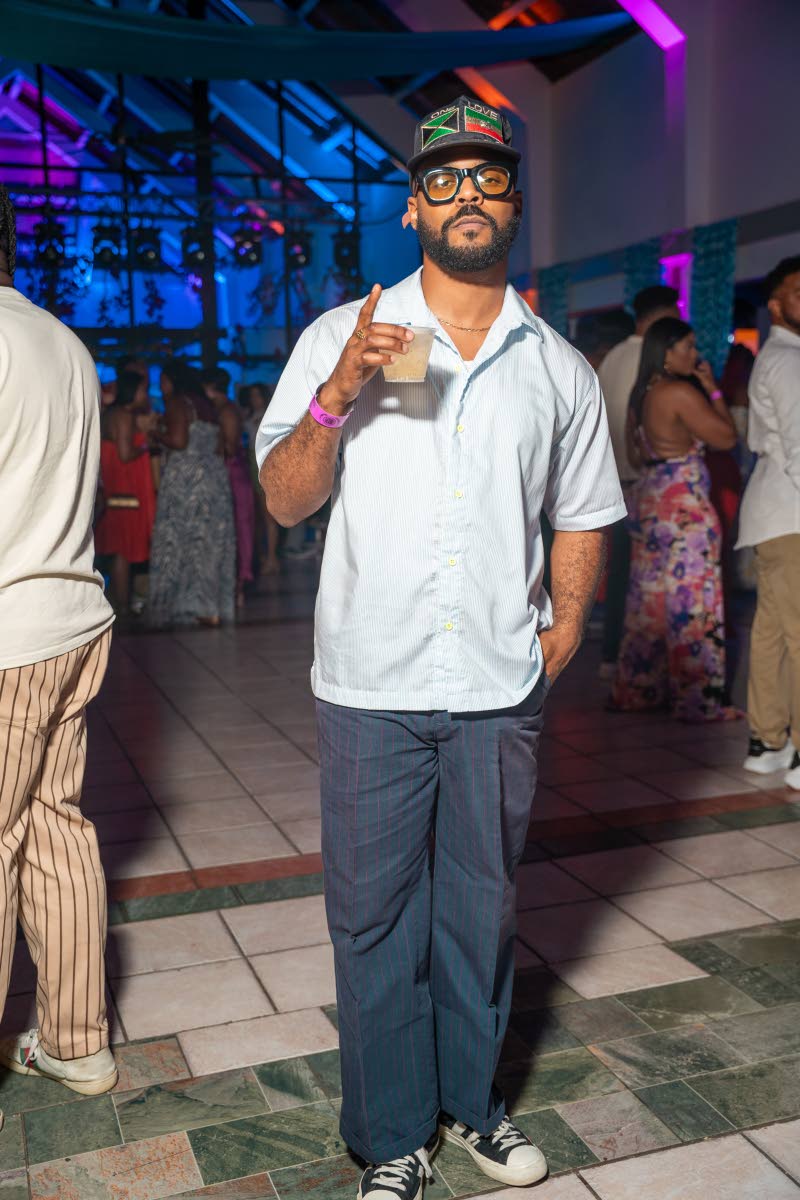 Photographer Russell Hamilton steps in front of the lens, keeping it cool and casual. 