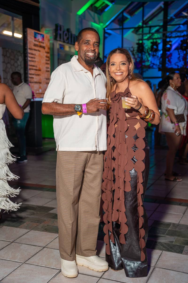 Project Manager Darren Hallwood pairs up with Elizabeth James, vice-president of wealth and client services at Sygnus, for a quick photo.