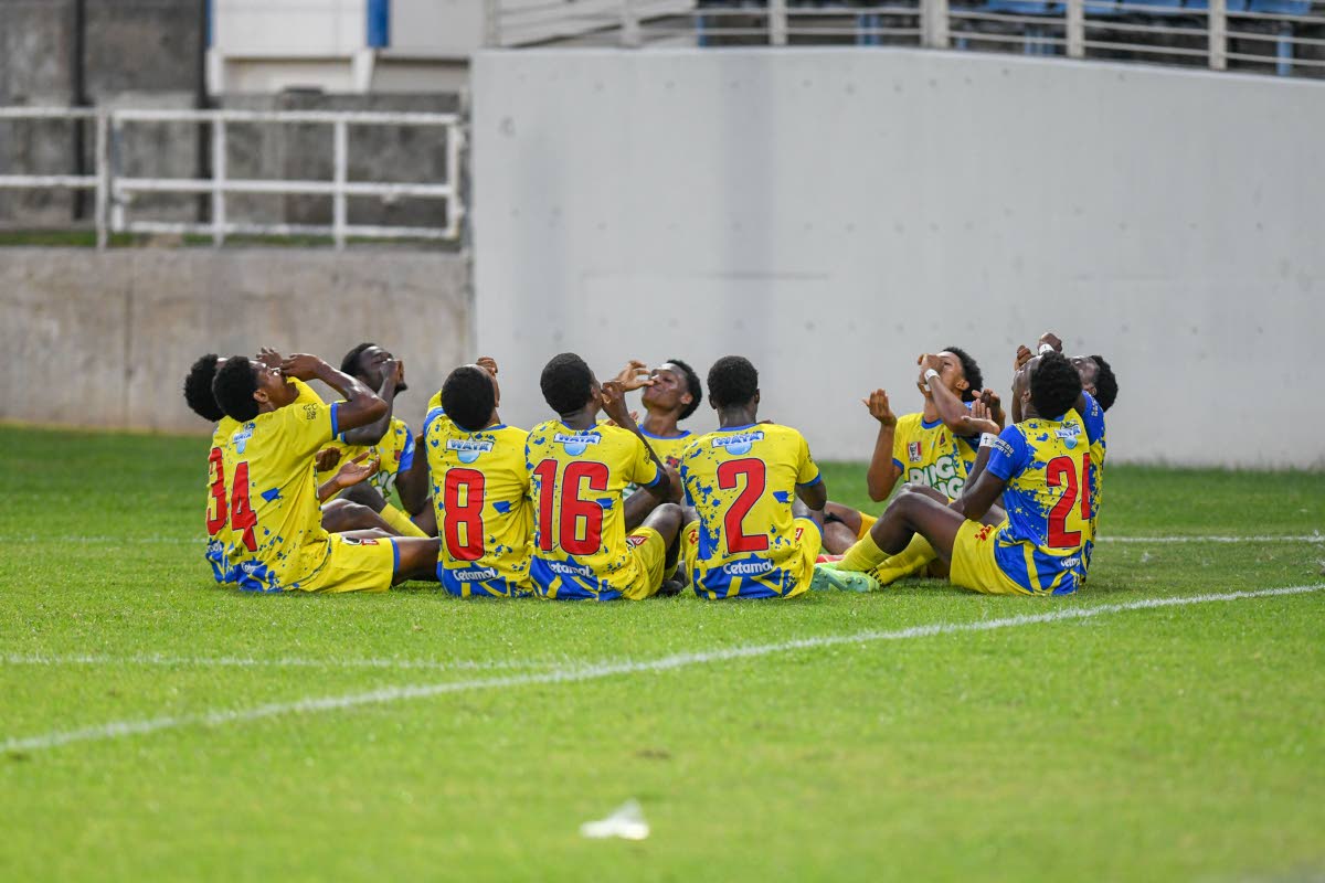 St Elizabeth Technical High School’s players go through one of their rehearsed celebrations during the ISSA daCosta semi-final against Kemps Hill at Sabina Park on December 17.