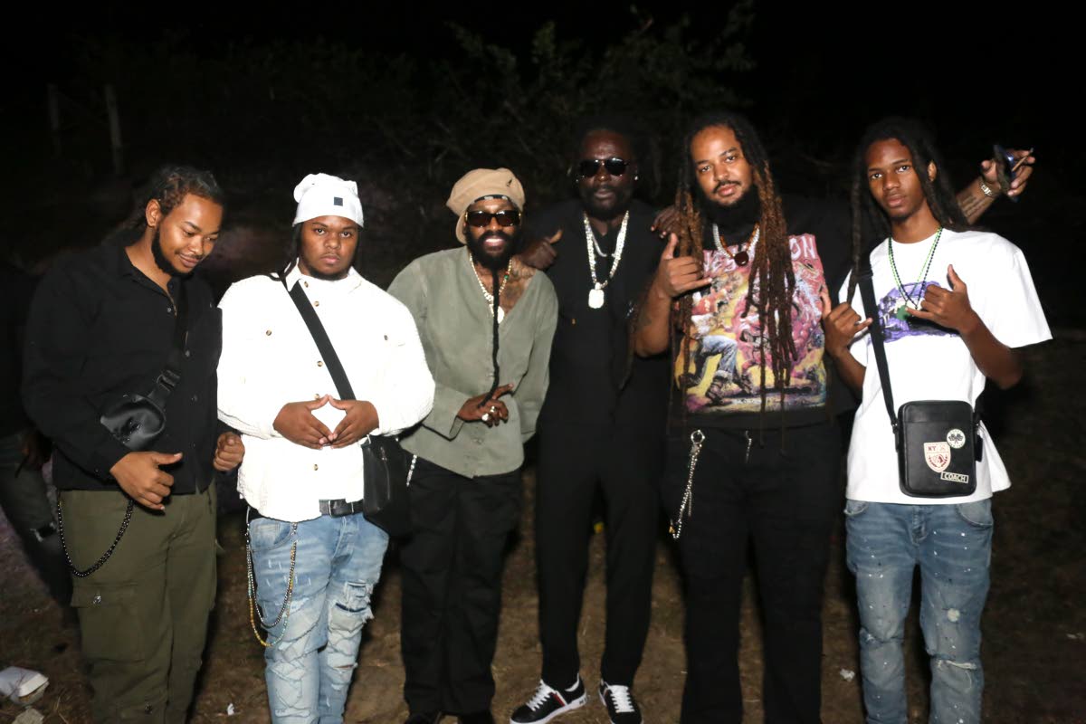 Tarrus Riley (third left) hangs out with (from left) Gelato Boss, Pam Pam, Angola Festival organiser Jah Bouks, Rani Rastaciti and Marcus.