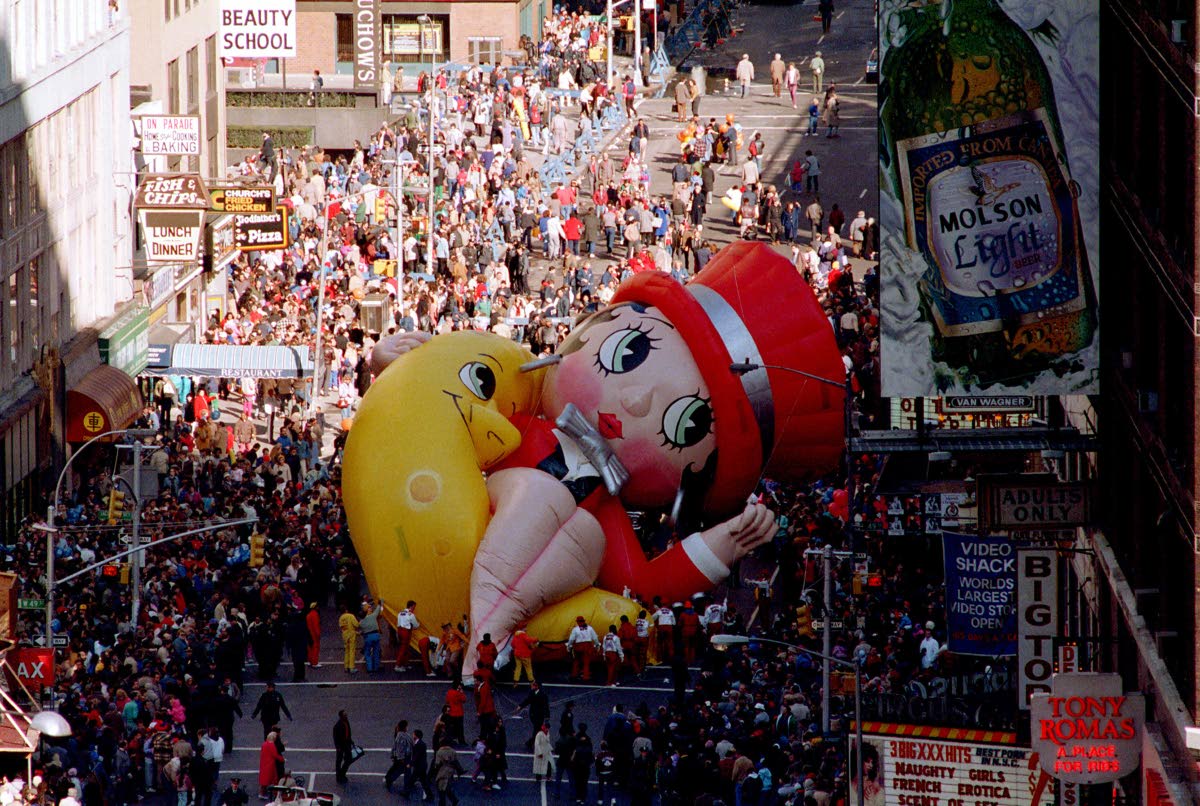 Betty Boop collapses on Broadway near 49th Street as handlers work to raise the deflated helium balloon during the Macy’s Thanksgiving Day Parade in New York, USA.  