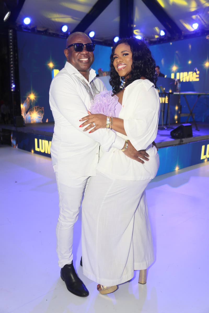 Cosying up in white co-ord sets are King’s Counsel Ian Wilkinson and his wife, attorney-at-law and media personality Khadine ‘Miss Kitty’ Wilkinson. 