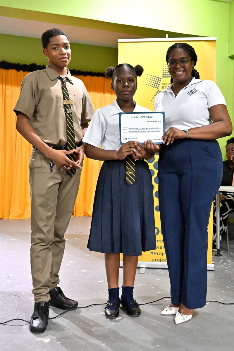 Project STAR Training Coordinator Kelly Griffith (right) presents a certificate representing a $100,000 cash implementation grant to the winning Business Pitch Team Jason Campbell (left) and Nakeida Williamson (centre) from Kingston Technical High School f