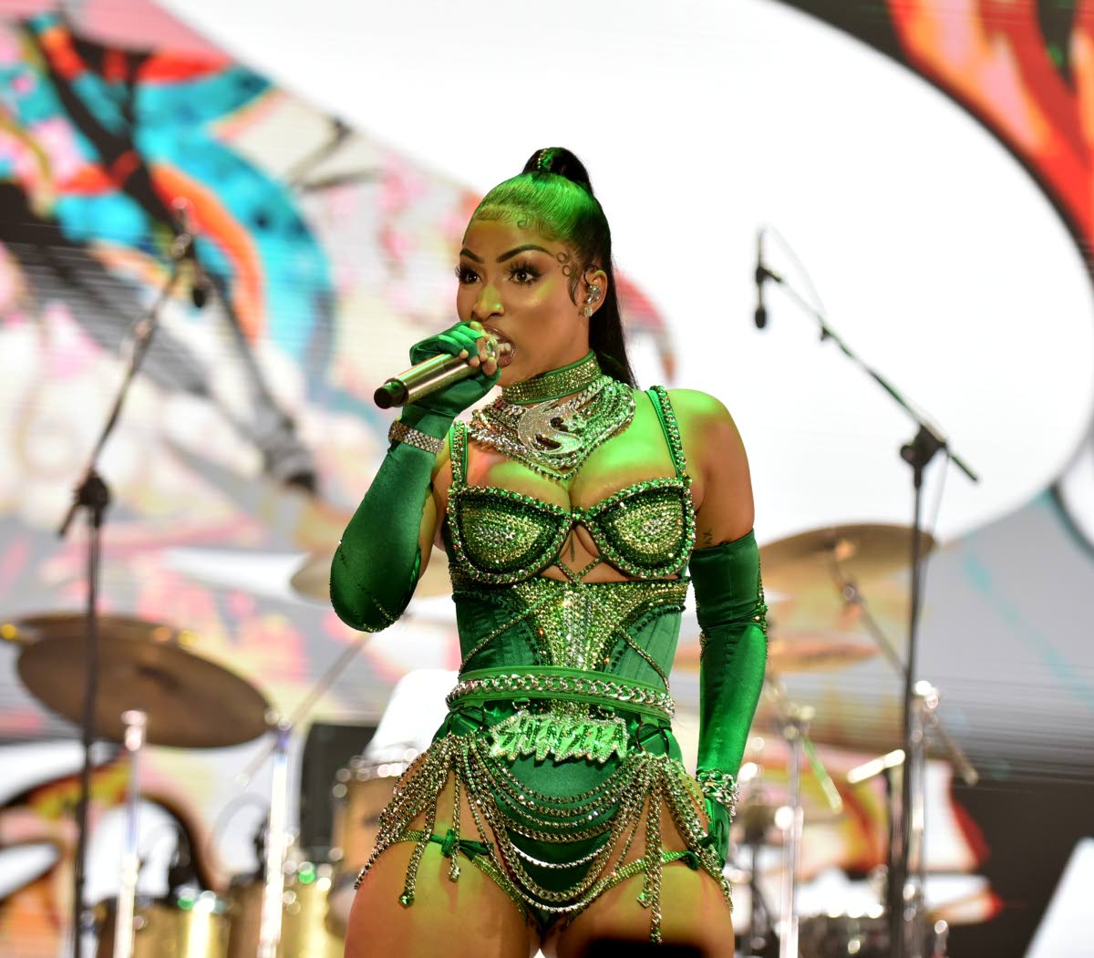 Centre: Shenseea featured in Moliy’s top song for 2025, ‘Shake it to the Max Remix’, alongside Skillibeng.