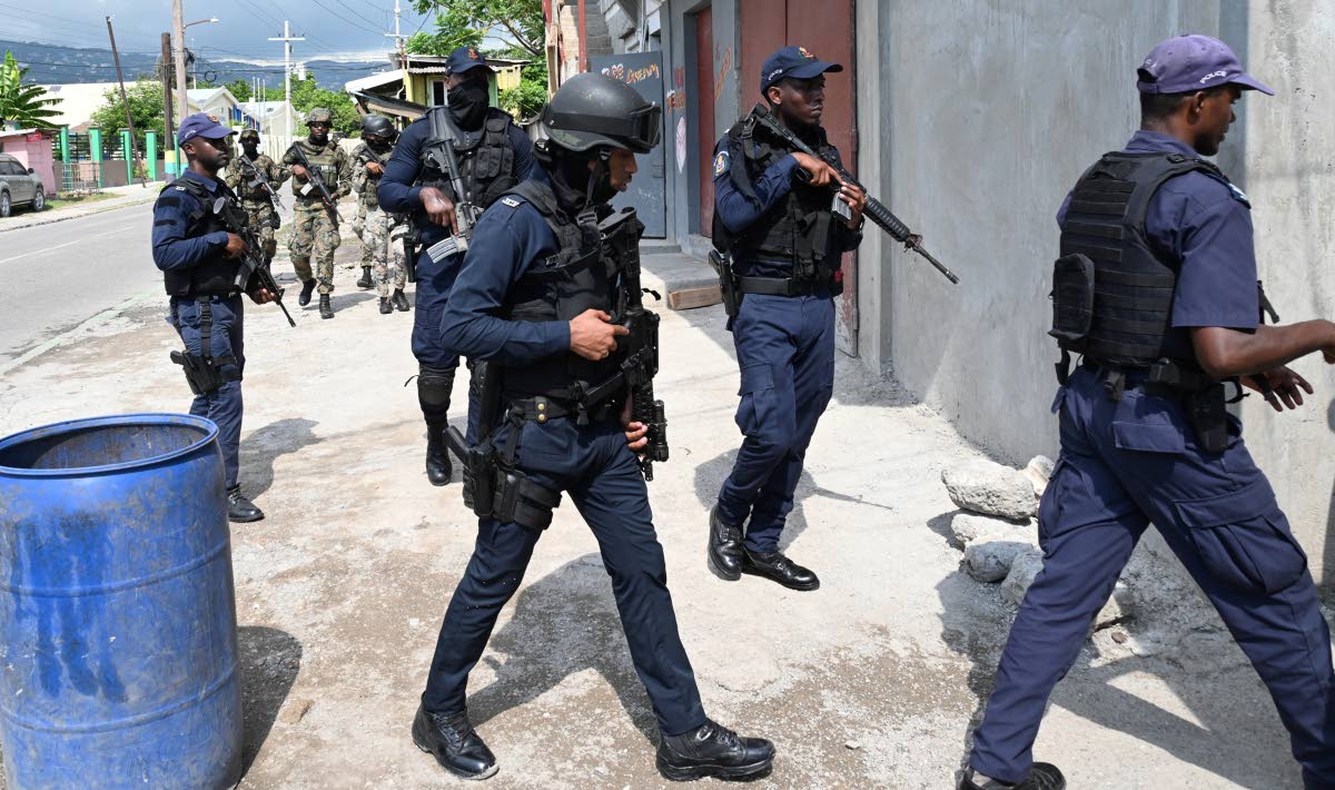 
A joint security forces team in Olympic Gardens, St Andrew, after Prime Minister Andrew Holness announced the imposition of three SOEs blanketing at least seven parishes on November 15, 2022.