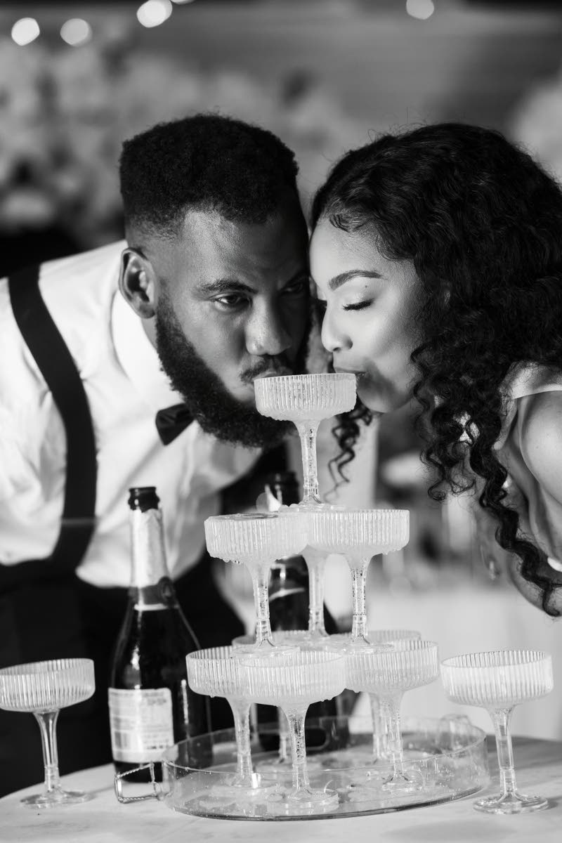 The couple celebrated their union with a sparkling champagne tower.