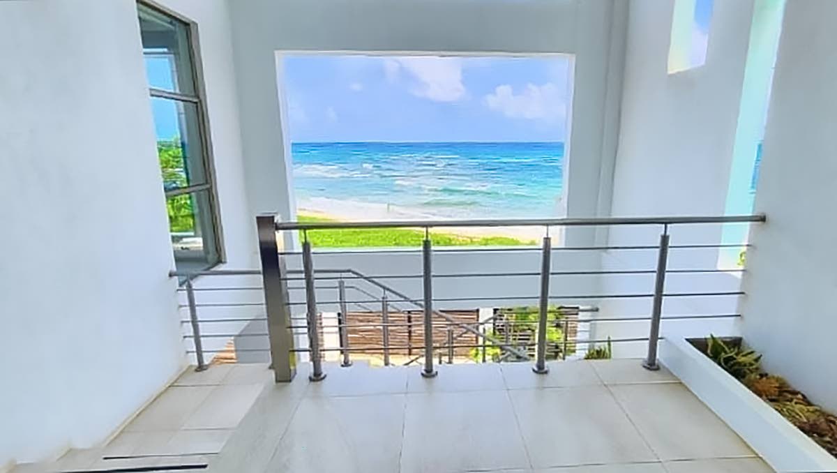 The architecture creates sizable openings to the beachfront.