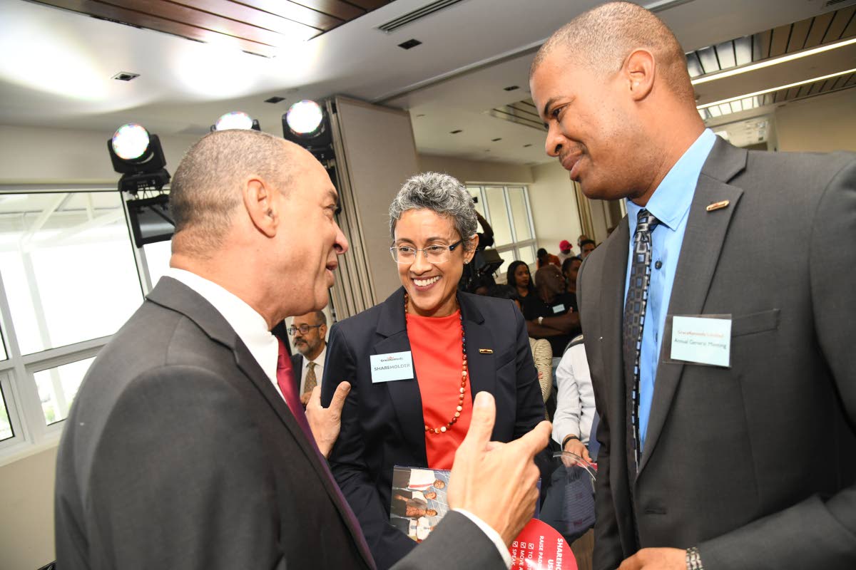 Don Wehby (left), group chief executive officer of GraceKennedy, speaking with Gina Phillipps Black, director of GraceKennedy and his future successor Frank James, CEO of GK Foods (Domestic), at GraceKennedy Limited’s annual general meeting in 2019. 