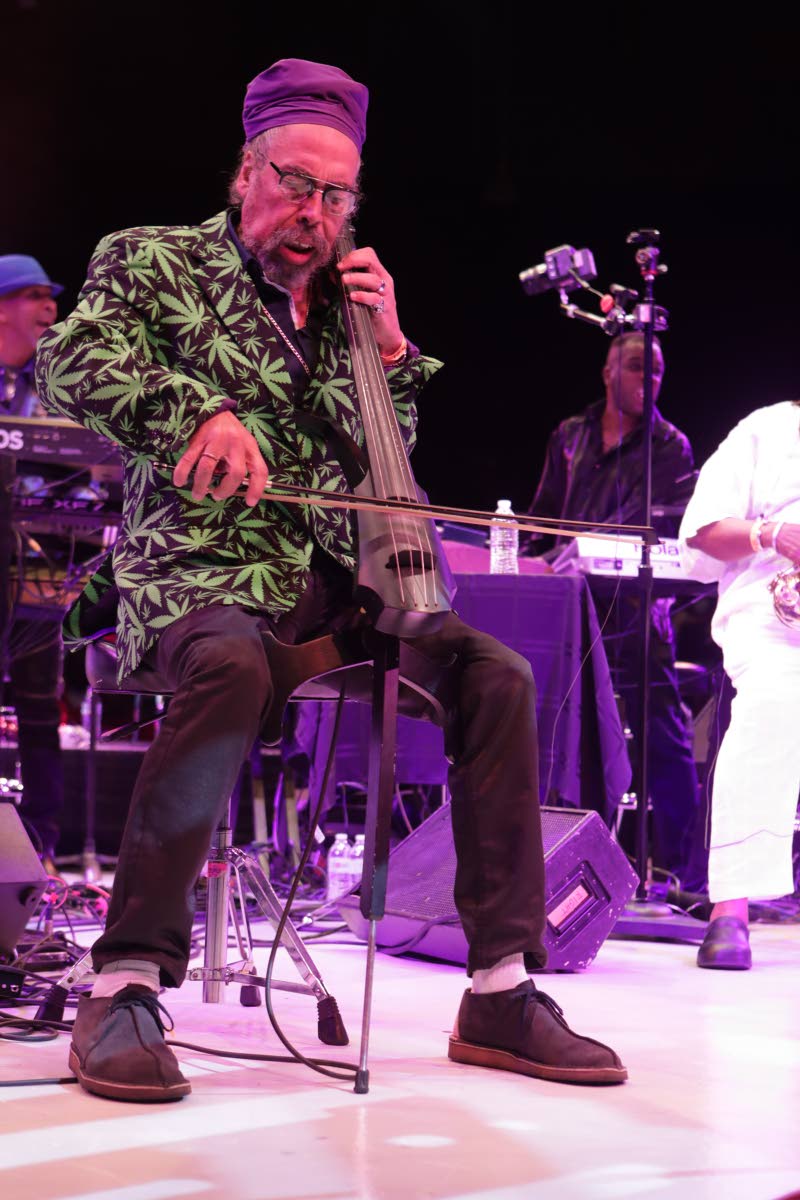 Cat’ Coore plays the National Song For Schools on his cello in honour of his late friend, broadcasting theatre titan, Leonie 
Forbes.