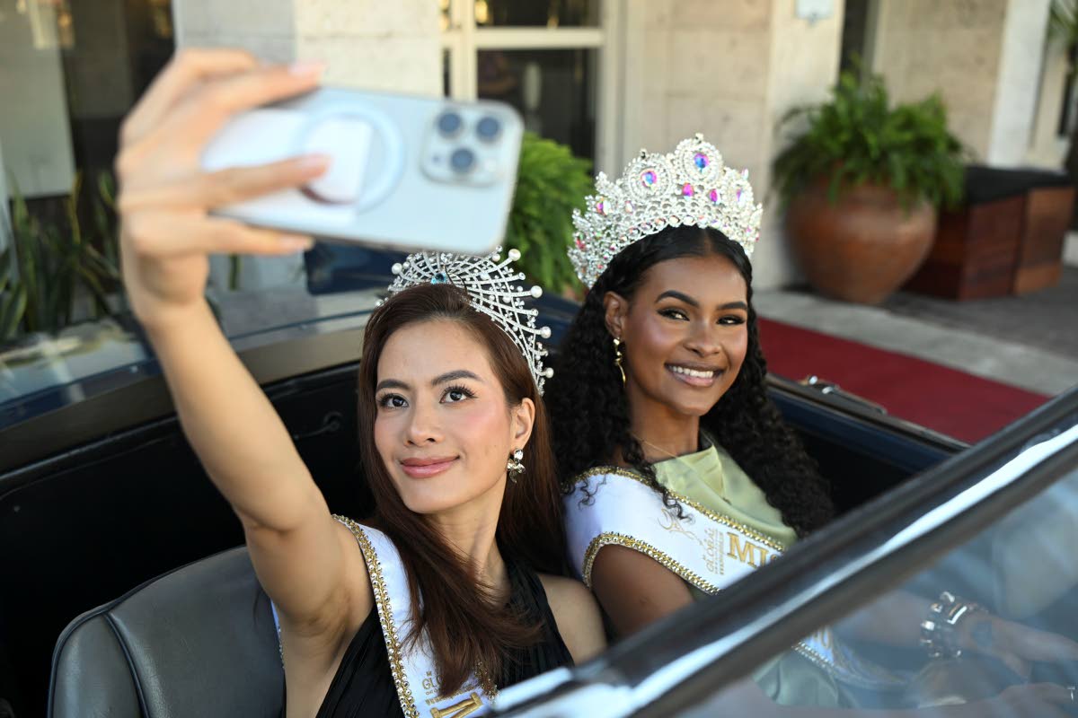 Capturing the moment in Jamaica, Greenwood (right) snaps a selfie with Miss Global 2025 Nguyen Dinh Nhu Van at S Hotel Kingston on Friday. For Greenwood, sisterhood is one of the most cherished experiences she has gained since stepping into the world of pa