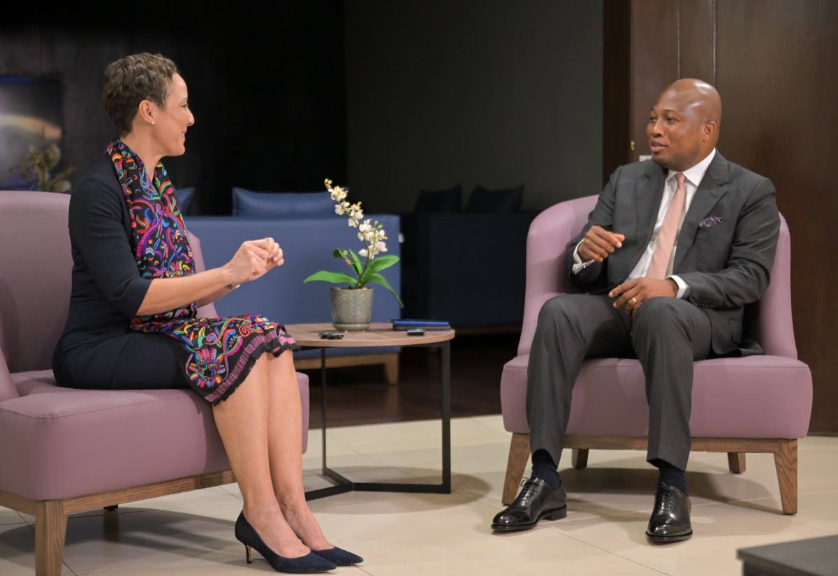 Minister of Foreign Affairs and Foreign Trade Kamina Johnson Smith (left) in conversation with Minister of Foreign Affairs of the Republic of Ghana, Samuel Okudzeto Ablakwa, following his arrival at the Norman Manley International Airport on Saturday. 