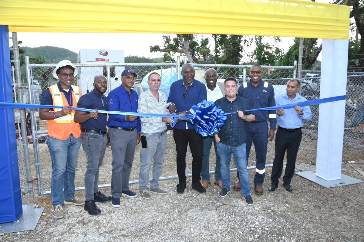 From left: Ricardo Case, JPS incident commander & senior vice-president for shared services, Sameer Simms; JPS vice-president of generation; Omar Sweeney, managing director of the Jamaica Social Investment Fund; Energy Minister Daryl Vaz; Eastern Westmorel