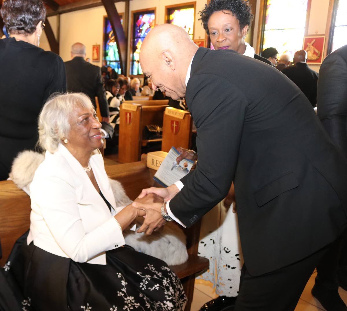 Jamaica’s Ambassador to the United States, Major General (Ret’d) Antony Anderson conveys words of comfort to Sonia Ward.