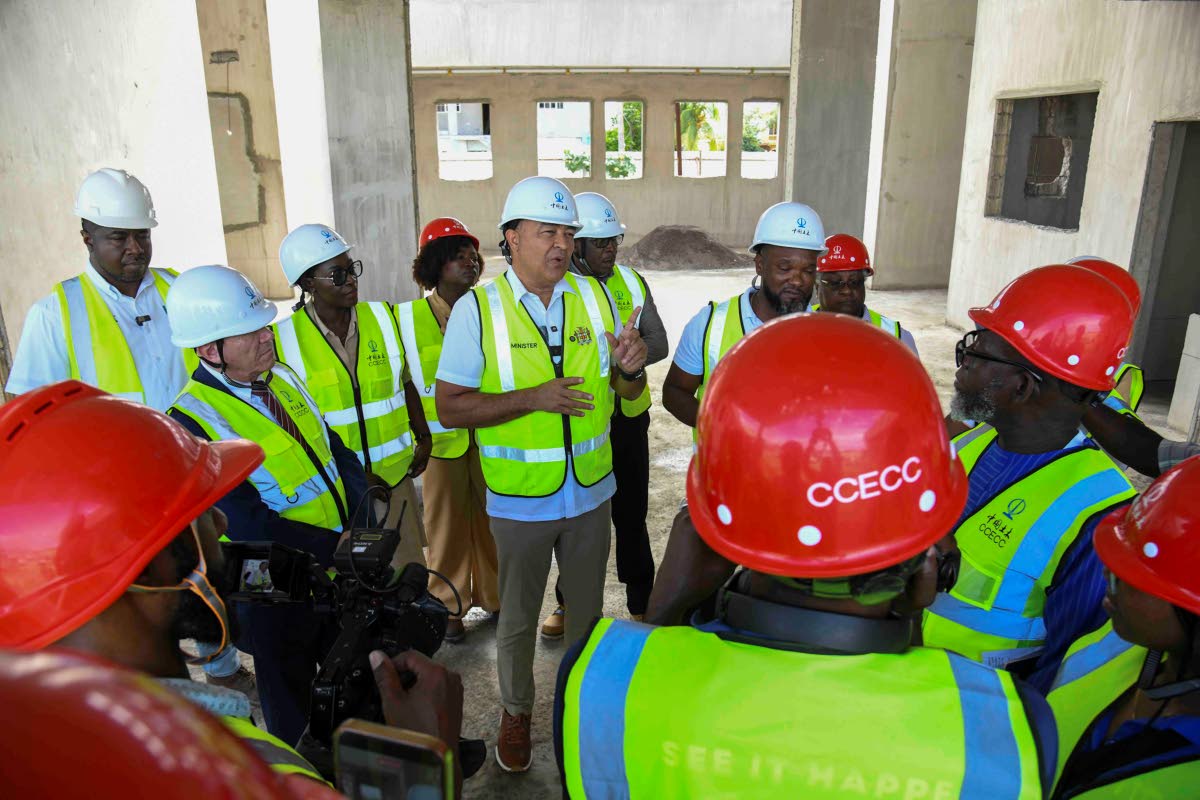 Dr Christopher Tufton, Minister of Health and Wellness speaks with the media after touring the Greater Portmore Health Centre on Wednesday.