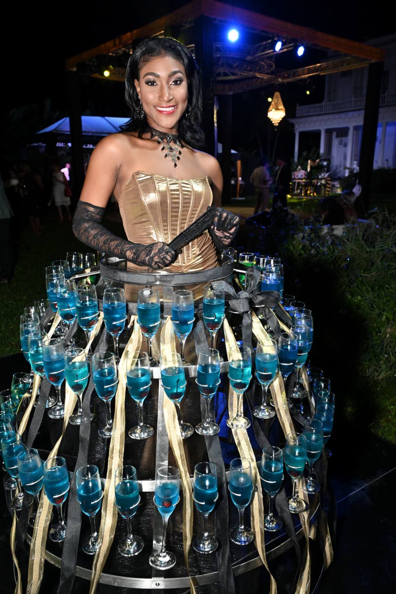 One could not miss Tika Rutherford of PP’s Logistics Company Limited as she greeted guests at the entrance with champagne.