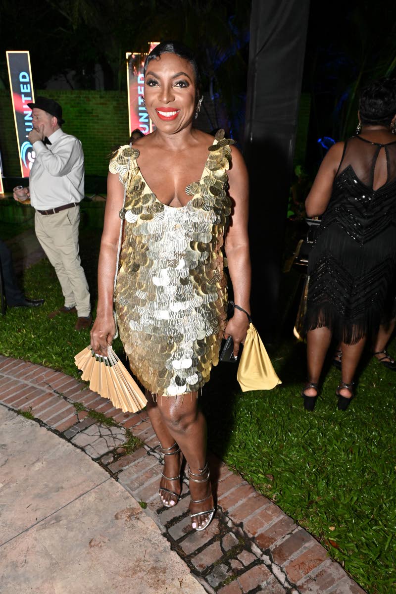 Looking fine and fabulous in a gold sequin mini is Donna Brown, newly appointed chief executive officer at Caribbean Assurance Brokers.