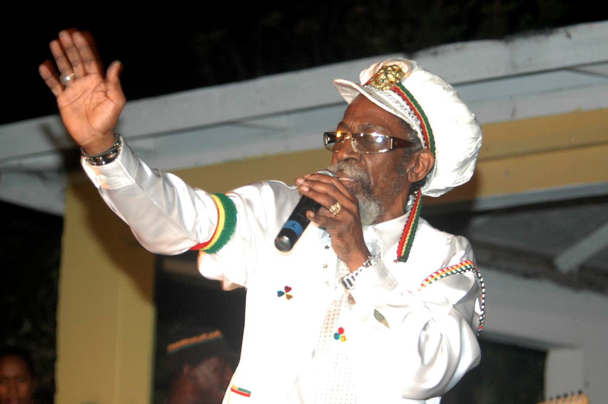 Bunny Wailer blesses the audience during his performance at a Bob Marley Birthday Bash at the MXIII Lawn in Negril in February 2009.