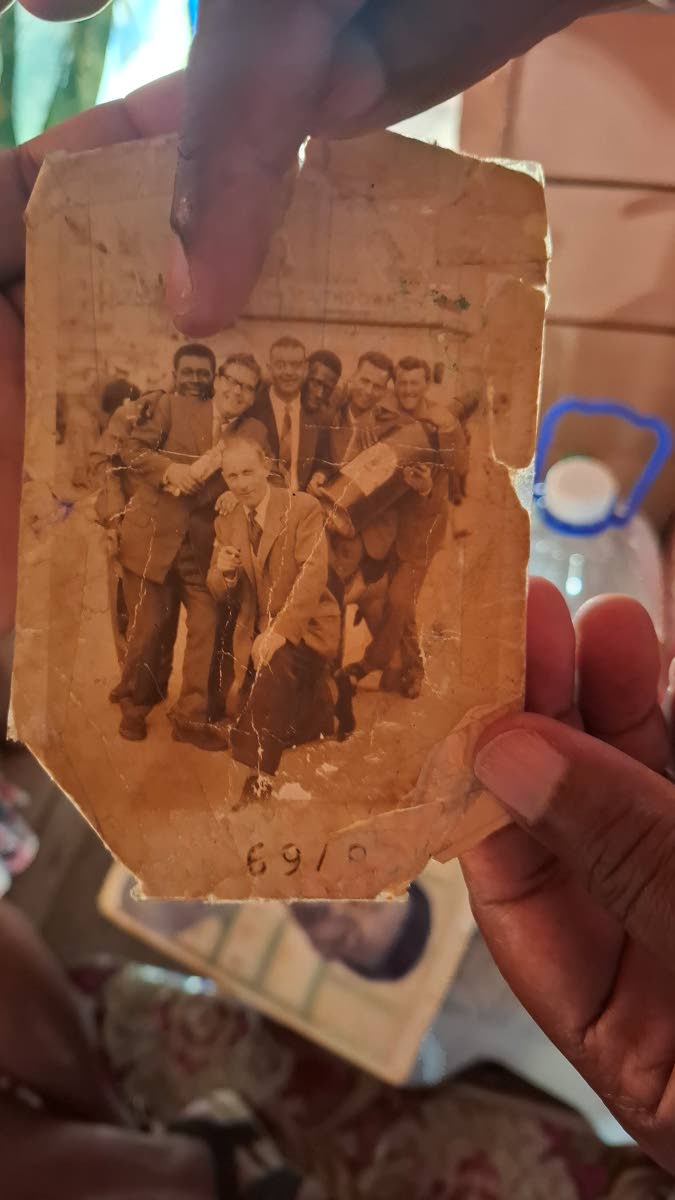 Isaiah Freckleton (back left) is pictured with fellow tailors during his time working in England.