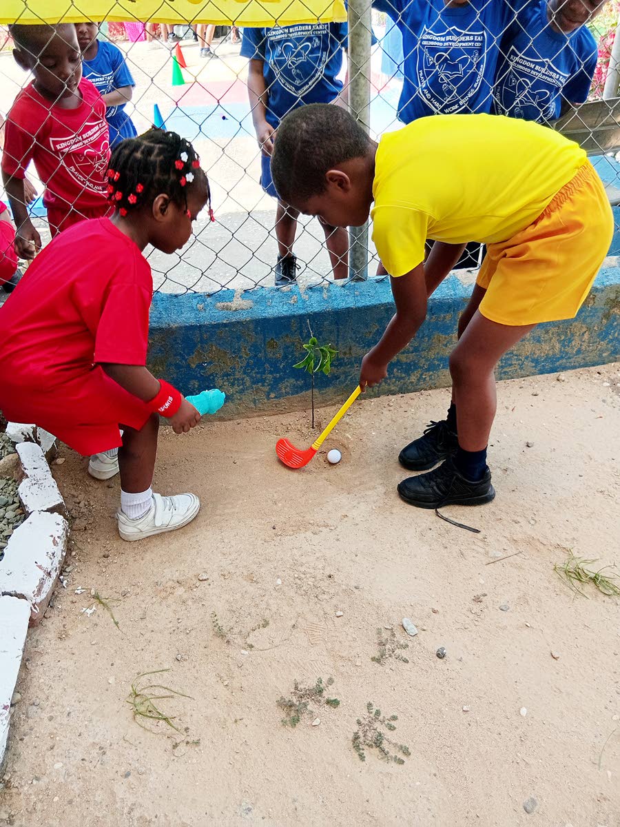 Students at Kingdom Builders take part in a game of kiddies’ golf.