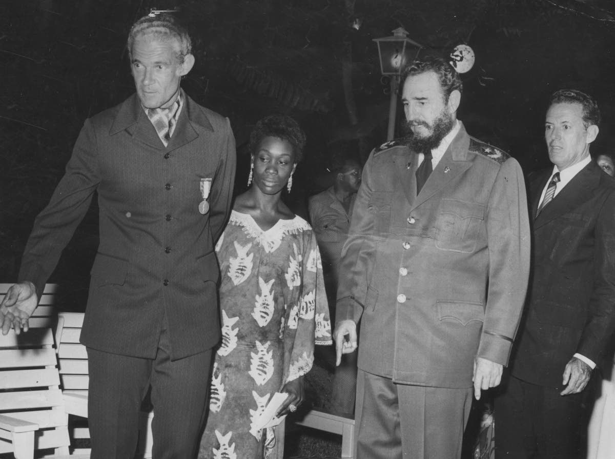 Prime Minister Michael Manley (left) wearing the Order of José Marti, Cuba’s highest honour, which was bestowed on him by Cuban President Fidel Castro (second right) during a ceremony in the Revolutionary Palace in Havana, Cuba, in 1975. The leaders are
