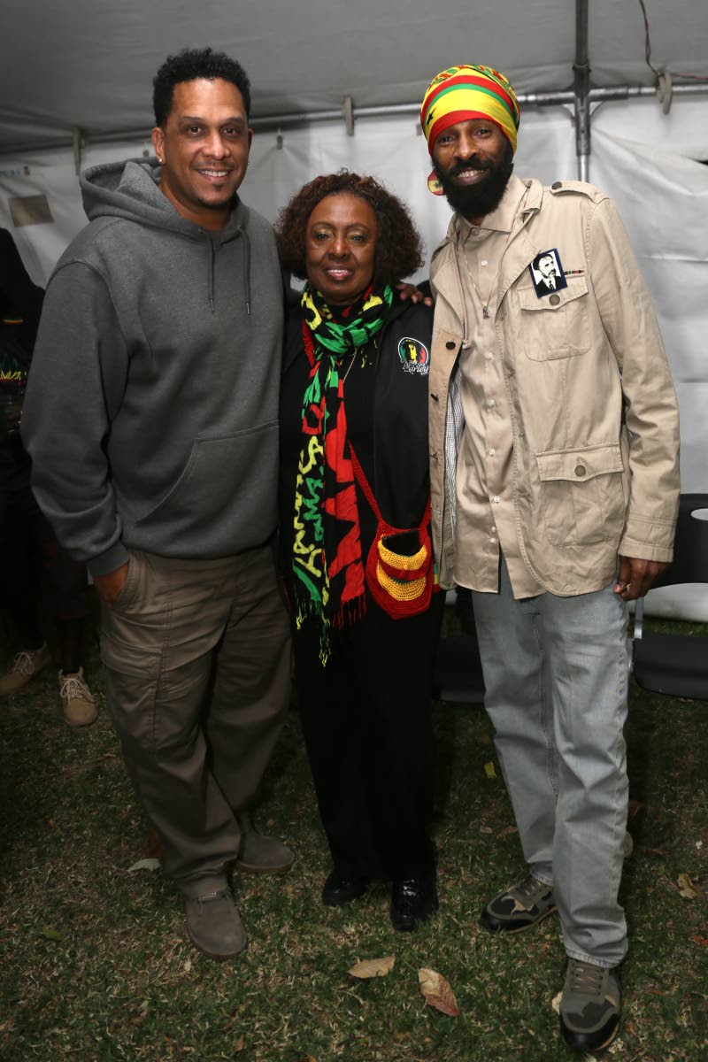 Minister of Culture, Gender, Entertainment and Sport Olivia Grange poses with DJ Bambino (left) and recording artiste Spragga Benz.