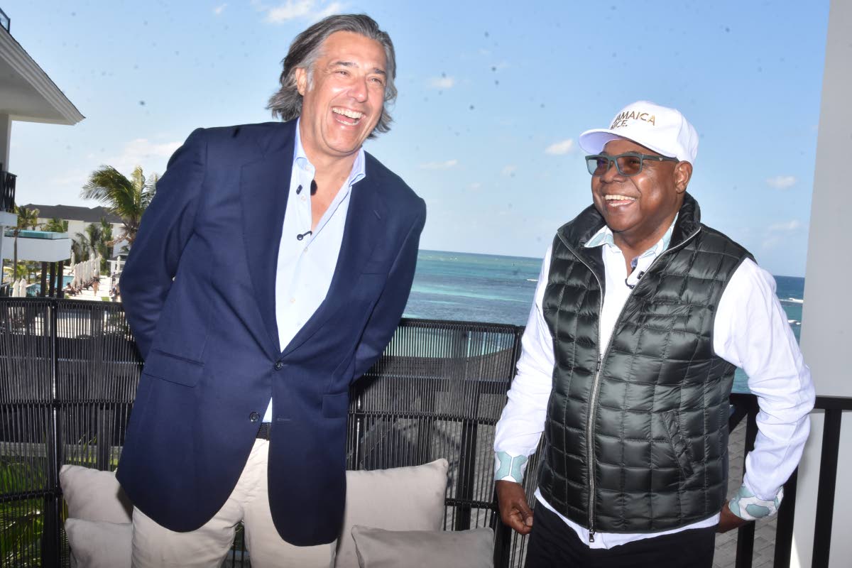 CEO of Excellence Oyster Bay Antonio de Montaner (left) and Jamaica’s Minister of Tourism Edmund Bartlett in a celebratory mood after the announcement of the planner expansion to the Falmouth, Trelawny resort. 