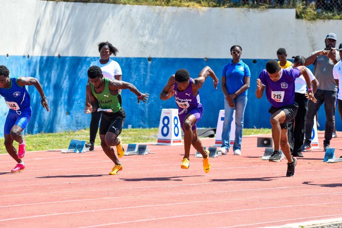 Athletes break from the starting blocks at last year’s Corporate Area Athletics Championships at Jamaica College’s Ashenheim Stadium.