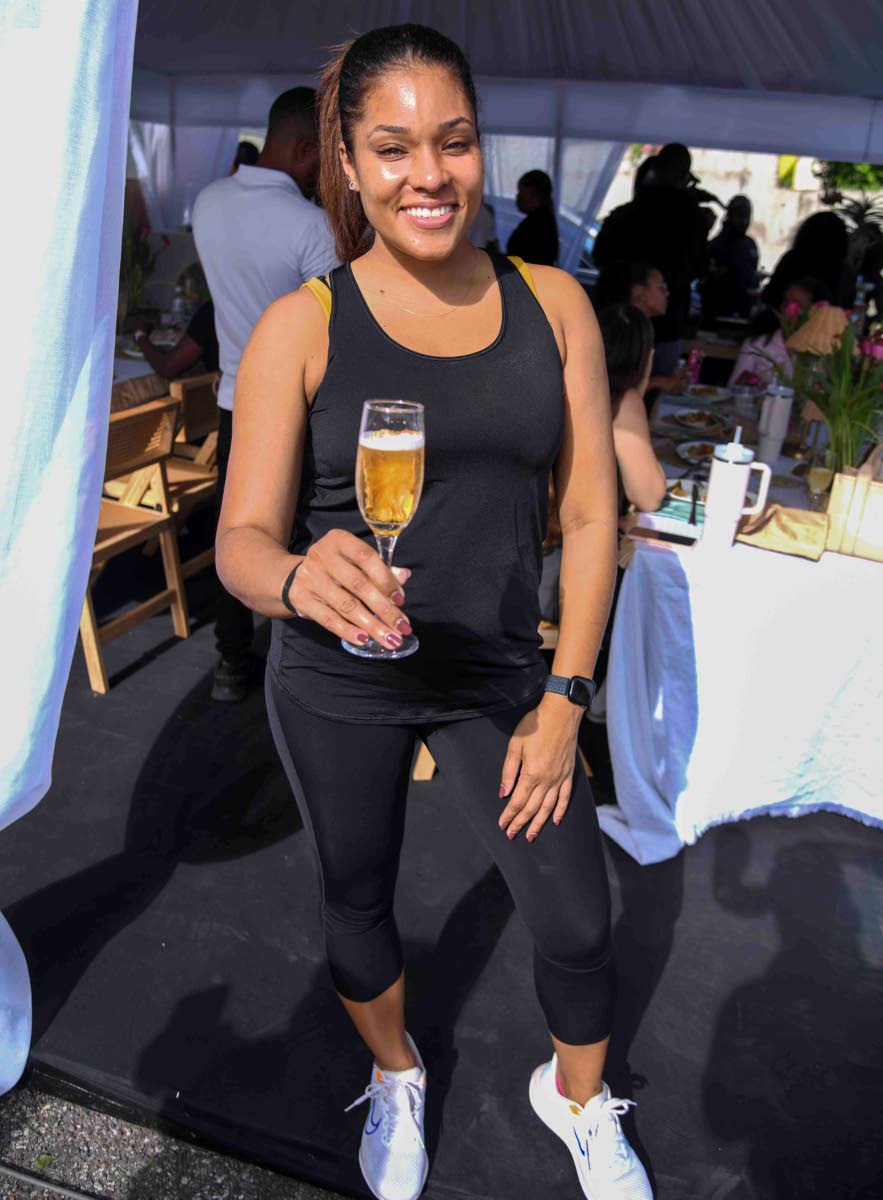 Peta-Gaye Simpson, vice-president of real estate at Sagicor Group Jamaica Limited, comes ready to sip, stretch and sweat.