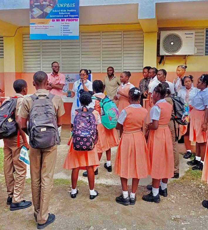 Region Two Vice President Tavia Robinson at Annotto Bay High School.