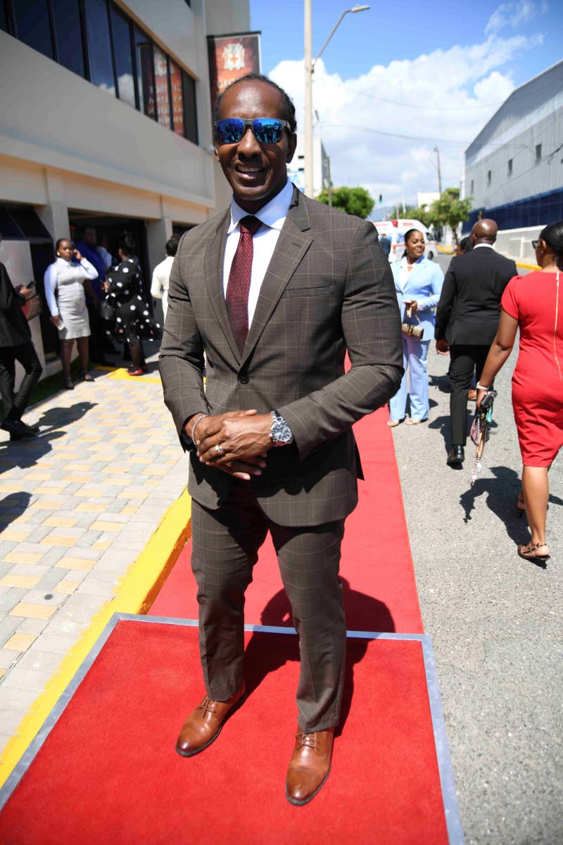 Alando Terrelonge, minister of state in the Ministry of Foreign Affairs and Foreign Trade and member of parliament for St Catherine East Central, pauses for a photo-op in his coffee-coloured suit from Hugo Boss. 