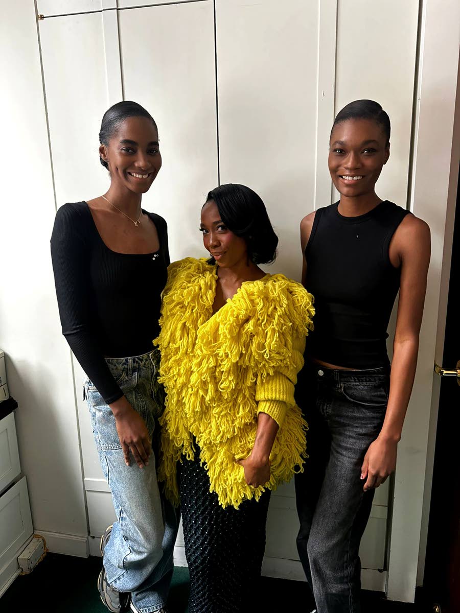 Legendary Jamaican sprinter and ‘Mommy Rocket’, Shelly-Ann Fraser-Pryce went backstage at Sunday’s Diotima show to greet SAINT International models Tami Williams (left) and Naki Depass.