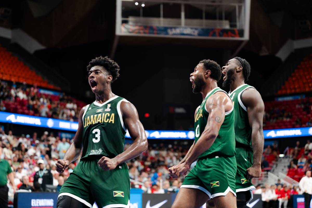 From left: Jamaica’s Chase Audige, Jordan Kellier, and Giovanni Fraser celebrating during a FIBA Basketball World Cup Qualifier against Puerto Rico.  
