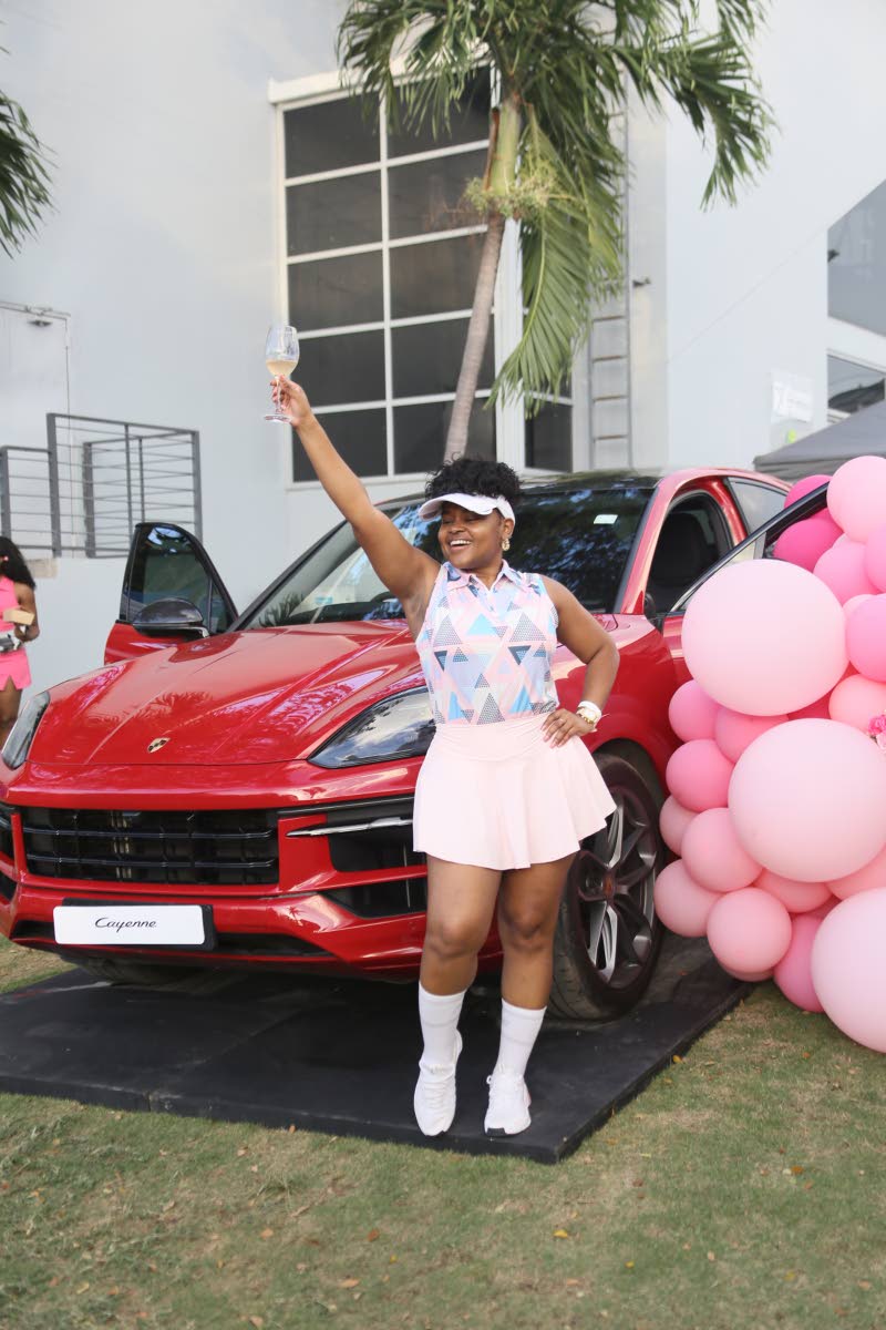 No novice to the golf course, Denecia Green, pharmacist, shows off her style and skill on the greens.