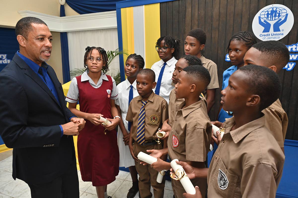 Robin Levy, Group CEO of JCCUL, shares words of wisdom and encouragement with students during the Credit Unions of Jamaica Bursary and Scholarship Awards 2025.